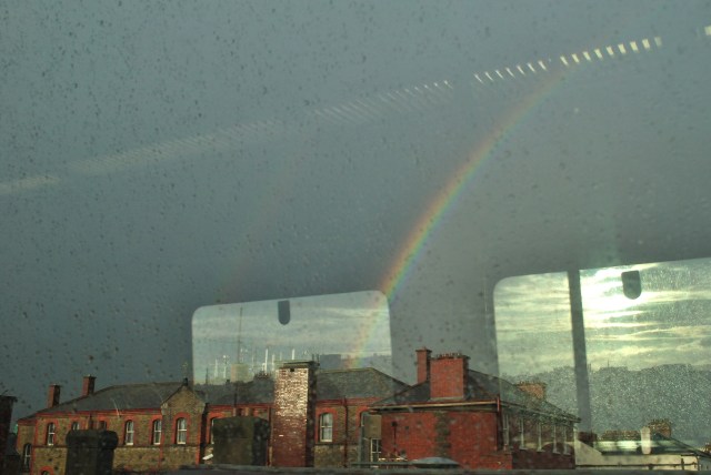 Rainbow across Dublin, from the train window... reflections