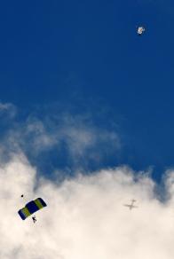 Photo fun... plane and shutes against the sky...