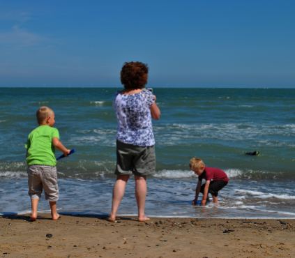 On the beach... granny and lads... soon their sister will join in the fun!