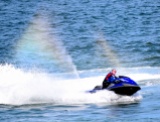 Riding the double rainbow - capturing the moment - jet ski having fun along South Beach, Arklow, Co Wicklow, May bank holiday 2018