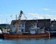 Orange hull - fishing vessel moored in Arklow